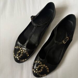 CHANEL Black and Gold Lucky Charm flats with Embellishments